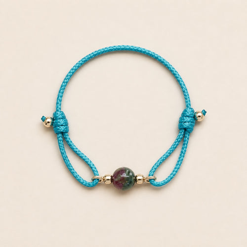 Blue Lagoon natural multicolor tourmaline bracelet with turquoise blue cord and gold-tone details by Sense Jewelry