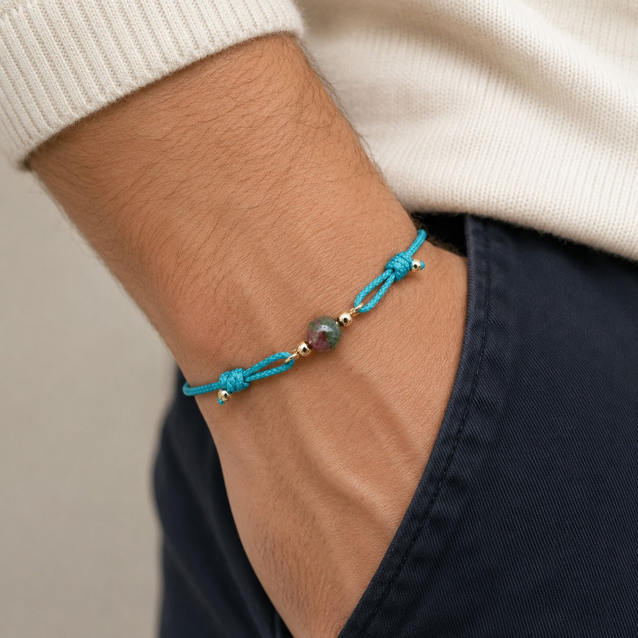 Blue Lagoon natural multicolor tourmaline bracelet with turquoise blue cord and gold-tone details by Sense Jewelry