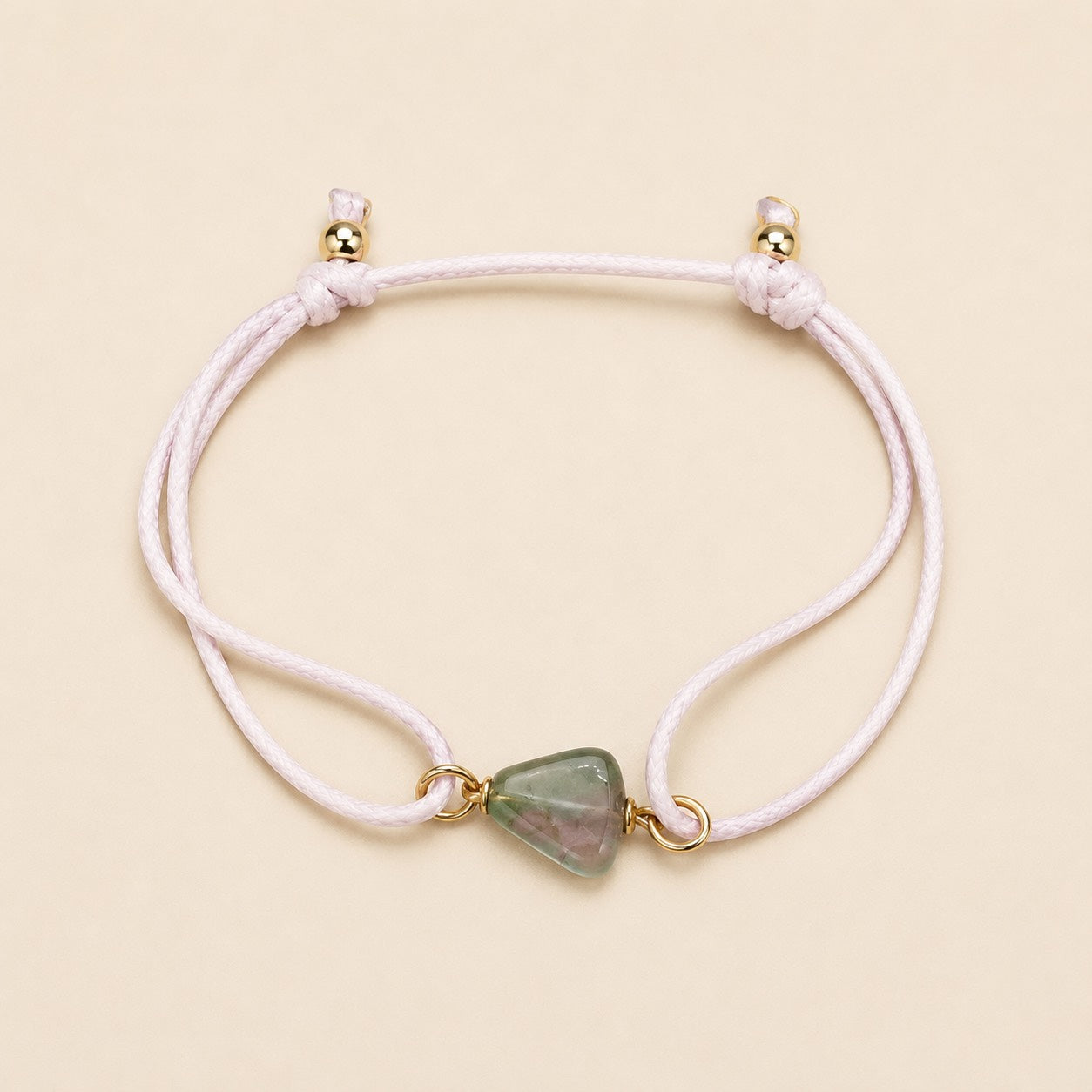 Secret Garden natural green and blush tourmaline bracelet with pale pink cord and gold details by Sense Jewelry