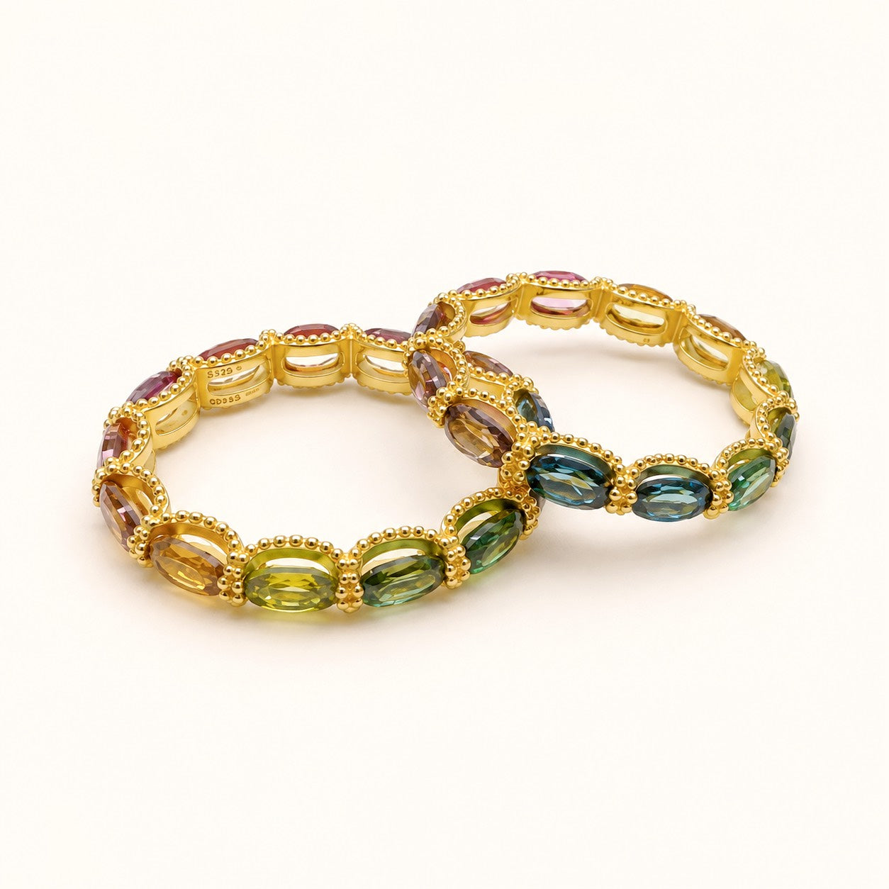 Rainbow on Your Fingertip multicolor natural tourmaline eternity rings with pink, green and champagne gemstones in gold-toned settings by Sense Jewelry