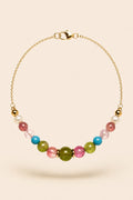 Summer Parties Signature Series bracelet featuring pink and green tourmaline, turquoise, pearl and gold-tone details.