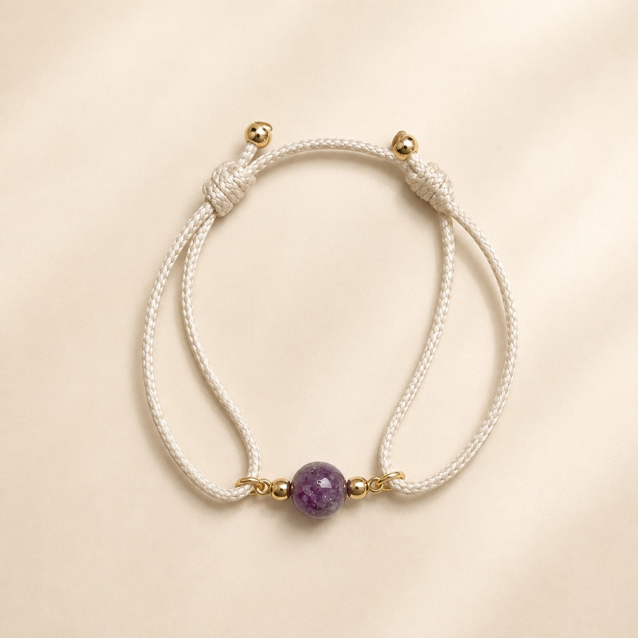 Violet Moon natural purple pink multicolor tourmaline gemstone bracelet with ivory white cord and gold-tone details by Sense Jewelry